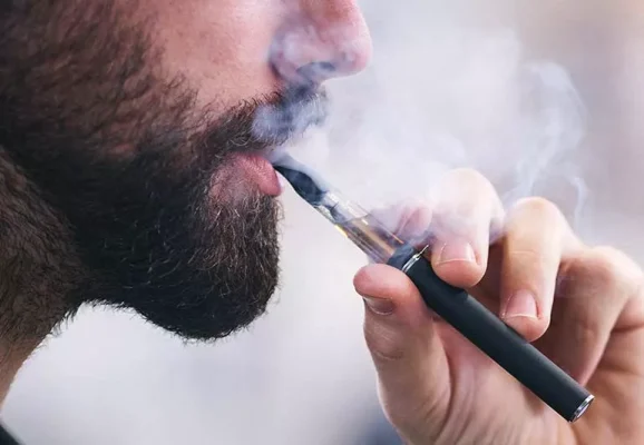 person-smoking-ecigarette-1069317828-770x533-1_jpg
